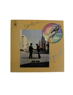 Disco vinyl firmado o autografiado por los integrantes de la banda Pink Floyd David Gilmour y Roger Waters. Álbum "Wish You Were Here"